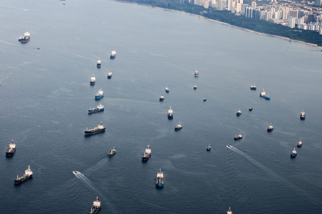 cargo ships in major sea lanes illustrating Indonesia global economy role in global trade routes