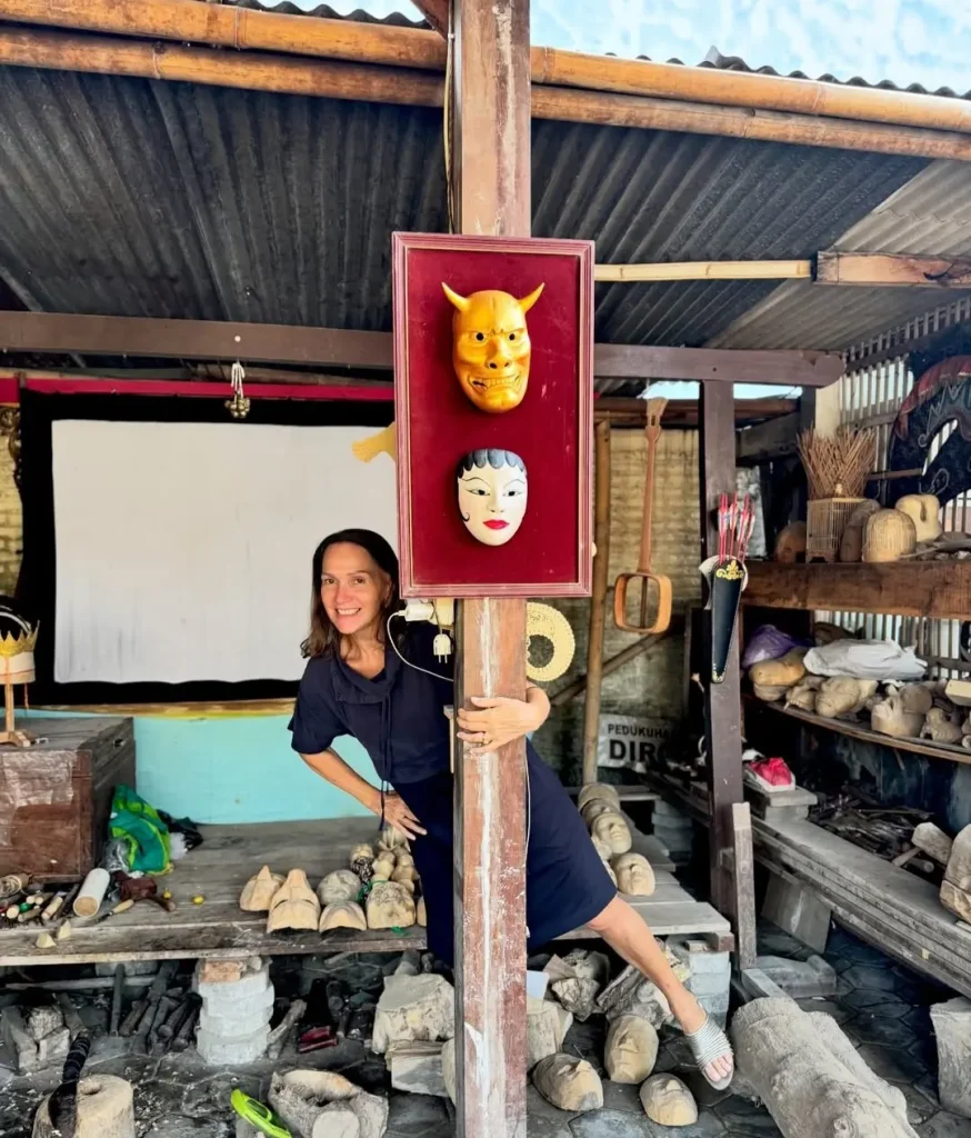 Janet De Neefe visiting a traditional hand-carved mask workshop in Yogyakarta, Indonesia.