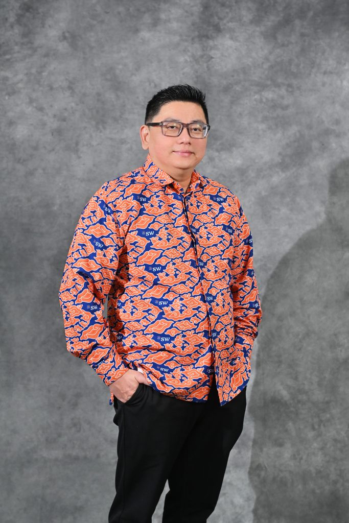 Portrait of Michell Suharli, CEO of SW Indonesia and advocate for ESG and corporate governance.