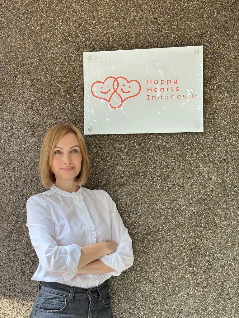 Sylvia Beiwinkler visiting a classroom as part of Happy Hearts Indonesia's mission to improve education across Indonesia.